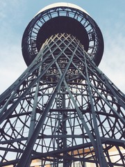 The metal tower. City urban architecture