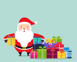 Santa Claus with gifts in hands. Santa Claus is standing in the middle of a huge heap of gifts.