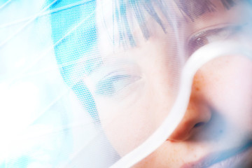 Closeup Portrait of a girl in a wedding dress