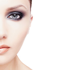 Close-up portrait of sexy caucasian young woman with bright make-up and clean skin