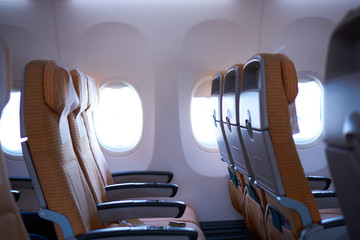 Empty airplane seats in the cabin