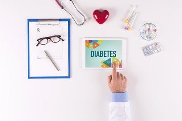 Doctor workplace with DIABETES on tablet screen