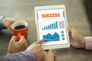 Business Graphs and Charts Concept with SUCCESS word