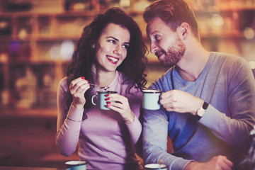 Couple dating in restaurant at xmas