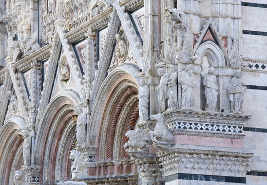 Ornamental statuary on facade of the Cathedral of Santa Maria Assunta, Siena, Tuscany
