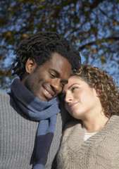 Romantic young multiethnic couple at park