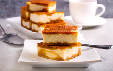 Stack of pumpkin cheesecake bars