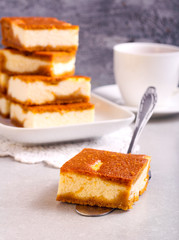 Stack of pumpkin cheesecake bars