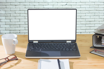 white screen display laptop on wood table