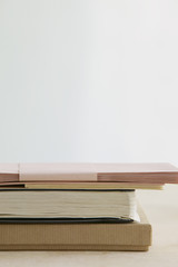 Stack of books and paper stationery studio shot