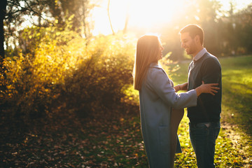 Happy couple in autumn park