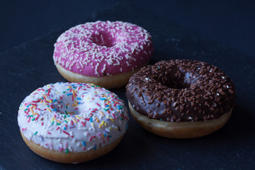 donuts on a black background