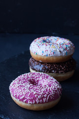 donuts on a black background