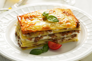 Traditional Italian lasagna made with minced beef. Side view