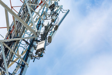 communication antenna tower with blue sky