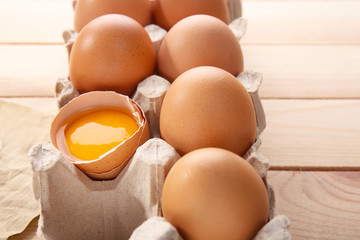 Package with fresh eggs, closeup
