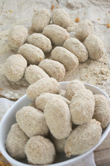 preparing handmade potato croquettes
