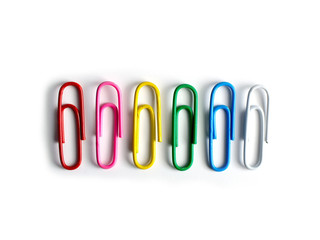 Paper clips binders and pins and colored