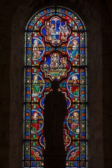 Poitiers, France - September 12, 2016: Colorful stained glass wi - obrazy, fototapety, plakaty