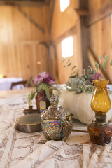 Fall Wedding Centerpieces with Pumpkins and Vintage Pieces