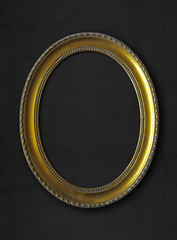 golden oval vintage frame isolated on black background with clipping paths