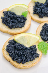 Tartine with caviar and lemon