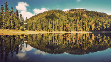 Fototapeta premium Majestic mountain lake. Amazing panorama at sunset. Instagram filter