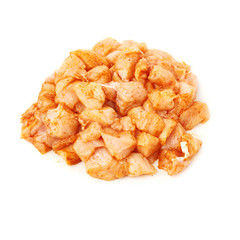 Raw chicken fillet cutted into pieces and spiced isolated over white background