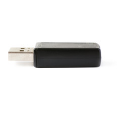 Flash drive or wireless receiver isolated over white background