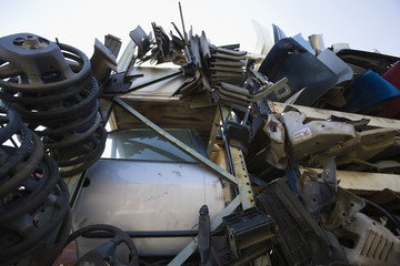 Old vehicle parts on car at scarp yard