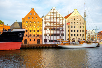 Naklejka premium Beautiful half-timbered houses on the riverside in the old town of Gdansk, Poland