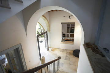 High angle view of hallway staircase in restored antique town house