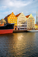 Naklejka premium Beautiful half-timbered houses on the riverside in the old town of Gdansk, Poland