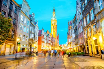 Deurstickers Night view on the illuminated town hall in the old town of Gdansk, Poland © rh2010