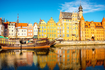 Morning view on the riverside of Motlawa river with beautiful buildings of the old town in Gdansk, Poland