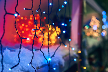 LED electric Christmas lights making beautiful magical colors and bokeh