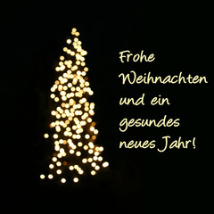Frohe Weihnachten und ein gesundes neues Jahr!, schlichte Weihnachtskarte mit Lichtern des Weihnachtsbaums/Christbaums