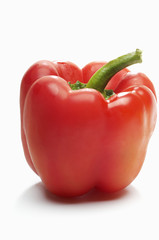 Closeup of a red bellpepper isolated over white background