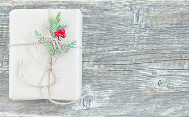 Christmas gift on a wooden background
