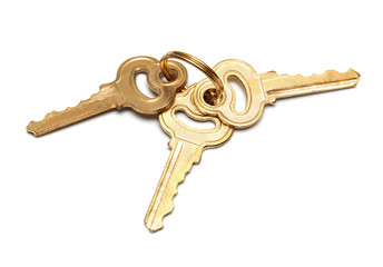 A bunch of keys isolated on white background. Flat lay, top view