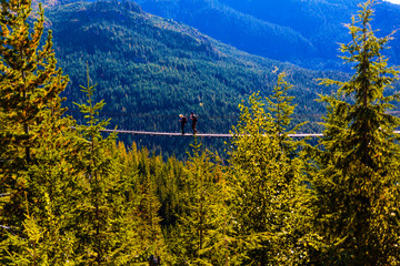 Squamish, BC, Canada - Sept. 22, 2016:  The Sea to Sky Gondola ride, the Summit Viewing Deck and Sky Pilot Suspension Bridge are exhilirating experiences in the shadow of Sky Pilot Mountain peaks. © bullsiphoto