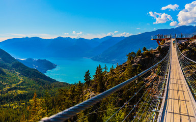 Naklejka premium Squamish, BC, Canada - Sept. 22, 2016: The Sea to Sky Gondola ride, the Summit Viewing Deck and Sky Pilot Suspension Bridge are exhilirating experiences in the shadow of Sky Pilot Mountain peaks.