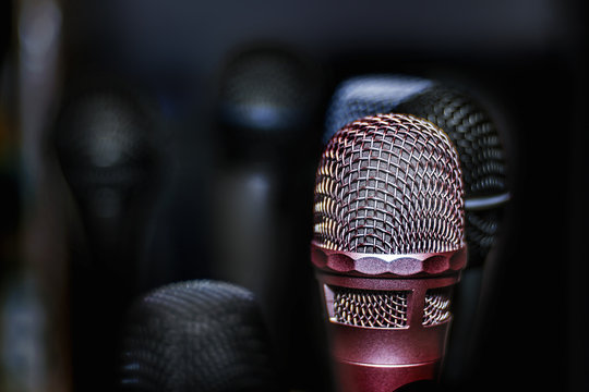 Silver microphone in a dark blurry  background