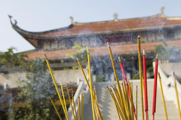 Incense Sticks Burning Outside of Temple