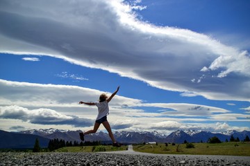 jumping girl on the road
