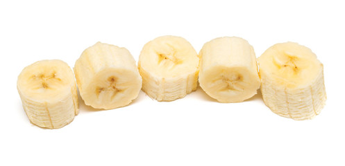 Banana slices isolated on a white background. Flat lay, top view