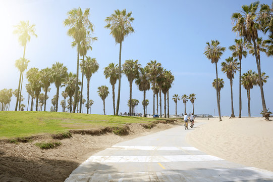 People enjoying a sunny day on the beach of Venice, California