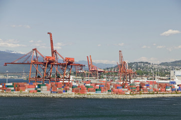 Cranes and cargo containers in Vancouver Harbour British Columbia
