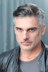 Fototapeta premium Mature handsome Caucasian man with gray hair