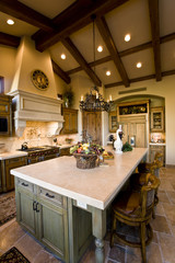 Kitchen interior with chairs at countertop in foreground
